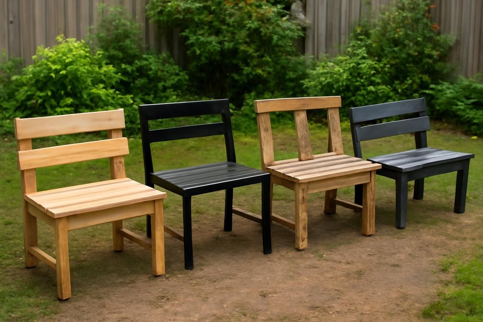 Four small garden bench samples made from wood, metal, pallet boards and composite material in a backyard